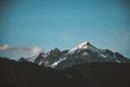 Mountain Landscapes - Stunning view of snow-capped mountains against a #1054218