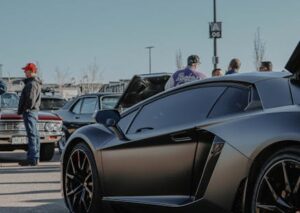 Luxury Cars - A stylish black Lamborghini Aventador parked out #11546077