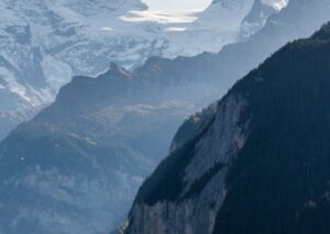 Mountain Landscapes - A breathtaking view of towering snowy peaks and #14699766