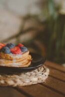 Food Aesthetics - Stack of pancakes topped with fresh strawberries #14716736
