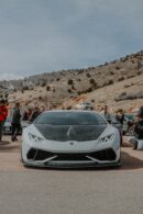 Luxury Cars - Front view of a Lamborghini Huracan with spectat #16124330
