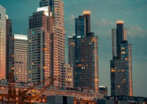 City Architecture - A breathtaking view of illuminated skyscrapers a #19559176