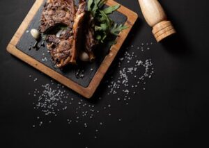 Food Aesthetics - Delicious lamb chops styled with herbs and coars #25243825