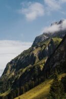 Mountain Landscapes - Stunning mountain view with lush greenery and cl #28829679