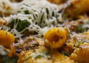 Food Aesthetics - Close-up of rigatoni pasta topped with melted ch #30823033