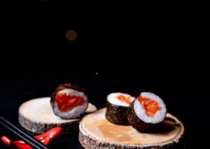Food Aesthetics - Artistic sushi presentation with salmon rolls on #31286783