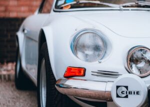 Luxury Cars - Close-up view of a vintage white sports car with #33285092