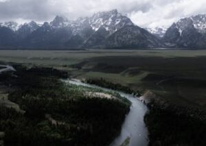 Mountain Landscapes - Aerial view of Snake River winding through a val #34031036