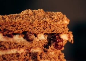 Food Aesthetics - A tempting slice of layered cake with cream and #34159031