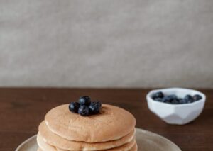 Food Aesthetics - A mouth-watering stack of pancakes topped with f #4790311