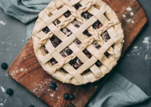 Food Aesthetics - Delicious lattice-top pie with blueberries on a #5107179