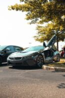 Luxury Cars - Luxury sports car with scissor doors open in a s #8717335