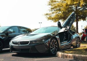 Luxury Cars - Luxury sports car with scissor doors open in a s #8717335