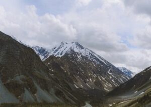 Mountain Landscapes - A stunning aerial view of a tranquil valley with #8761447
